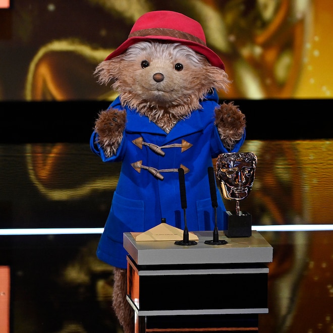 Paddington Bear presents the Children's & Family Film Award on stage during the EE BAFTA Film Awards 2026